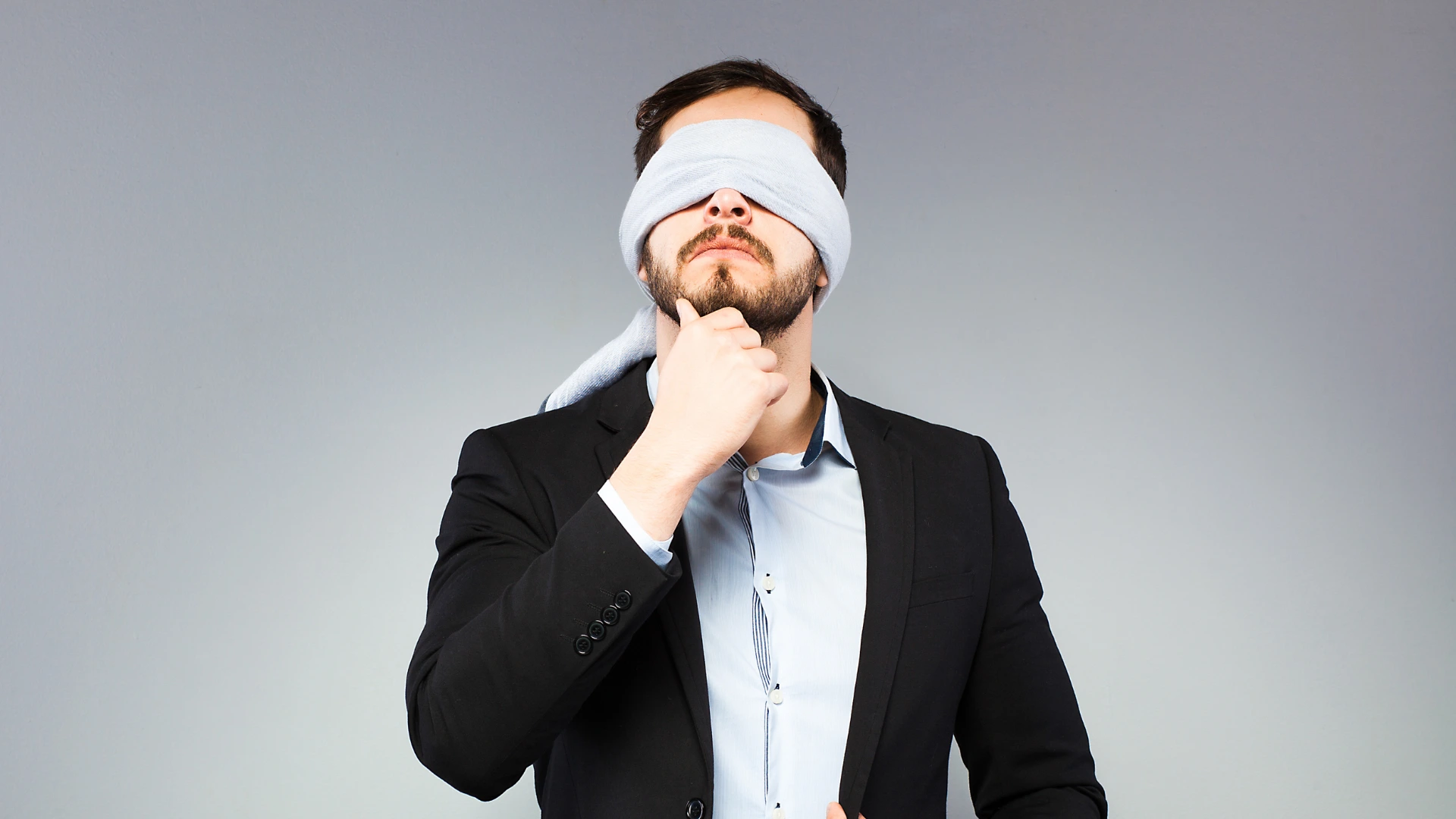 man blindfolded due to SLPP Audit